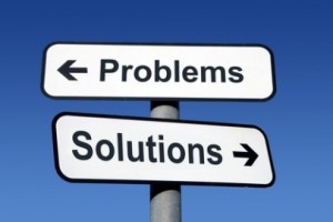 Signpost pointing to Problems and Solutions